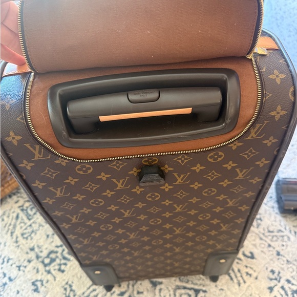 Louis Vuitton canvas rolling duffle bag, gently used. - Picture 3 of 14